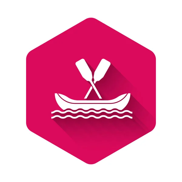 White Rafting boat icon isolated with long shadow. Kayak with paddles. Water sports, extreme sports, holiday, vacation, team building. Pink hexagon button. Vector Illustration