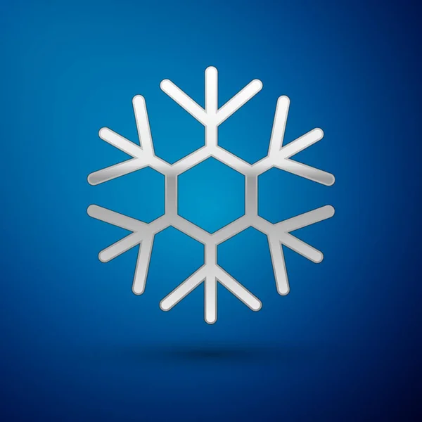 Icono de copo de nieve de plata aislado sobre fondo azul. Ilustración vectorial — Vector de stock