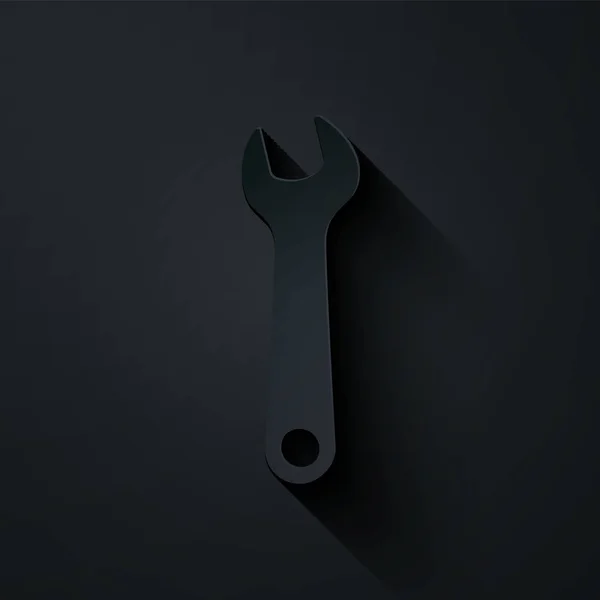 剪纸的Wrench图标孤立在黑色背景. 扳手修理工具。 服务工具符号。 造纸艺术风格。 病媒图解 — 图库矢量图片