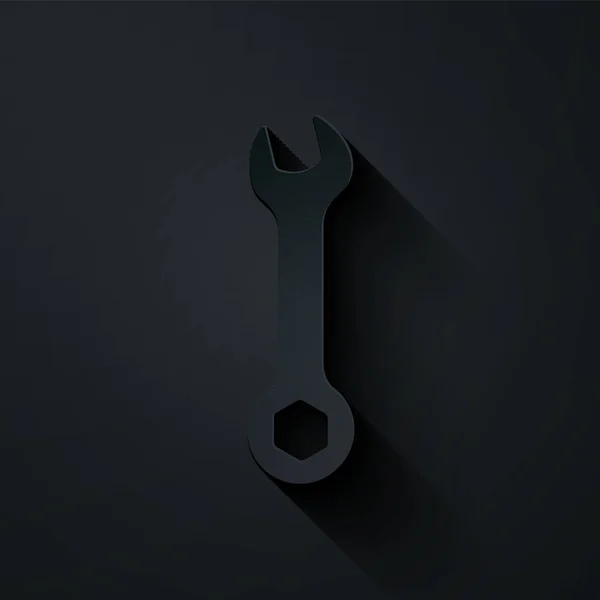 Papier gesneden Wrench pictogram geïsoleerd op zwarte achtergrond. Spanner reparatie tool. symbool van het servicewerktuig. Papierkunst stijl. Vector Illustratie — Stockvector