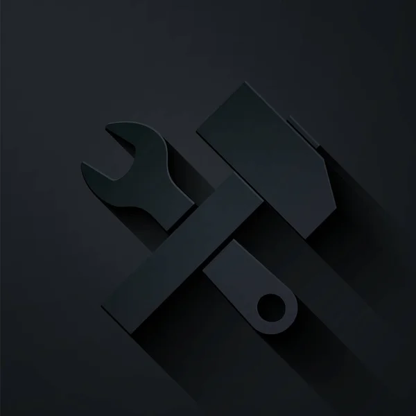 Papierschnitt kreuzte Hammer und Schraubenschlüssel Ikone isoliert auf schwarzem Hintergrund. Hardware-Tools. Papierkunst. Vektorillustration — Stockvektor