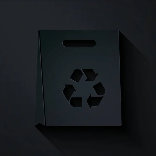 Saco de compras de papel cortado com ícone de reciclagem isolado no fundo preto. Saco com símbolo de reciclagem. Estilo de arte de papel. Ilustração vetorial — Vetor de Stock