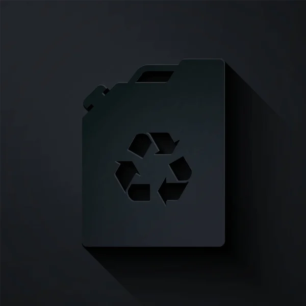 Papel de corte Eco icono del recipiente de combustible aislado sobre fondo negro. Eco bio y barril. Medio ambiente verde y reciclaje. Estilo de arte de papel. Ilustración vectorial — Archivo Imágenes Vectoriales
