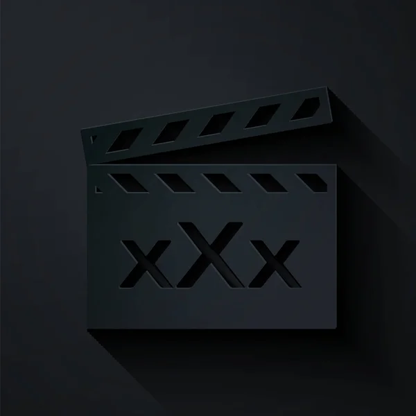 Papier découpé Film clapper avec inscription XXX icône isolée sur fond noir. Un symbole de restriction d'âge. 18 + signe de contenu. Chaîne adulte. Style art du papier. Illustration vectorielle — Image vectorielle