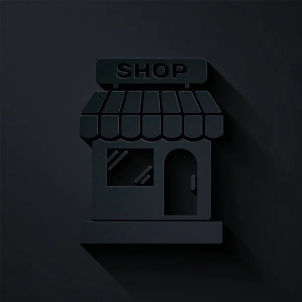 Papier snijden Winkelgebouw of winkel pictogram geïsoleerd op zwarte achtergrond. Winkel bouw. Papierkunst stijl. Vector Illustratie — Stockvector