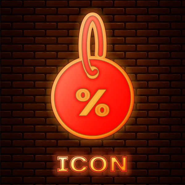 Glowing Neon Discount Percent Tag Icon Isolated Brick Wall Background — Stock Vector