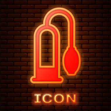 Glowing neon Penis pump icon isolated on brick wall background. Penis enlarger. Sex toy for men. Vacuum pump with a blower to increase the penis.  Vector Illustration