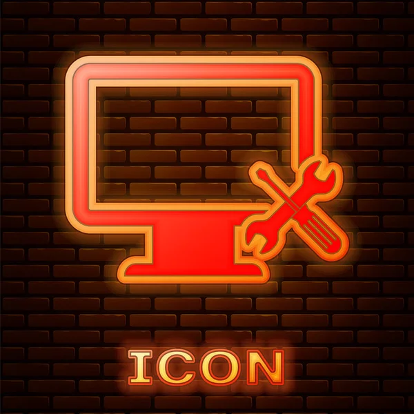 Glowing Neon Computer Monitor Screwdriver Wrench Icon Isolated Brick Wall — Stock Vector