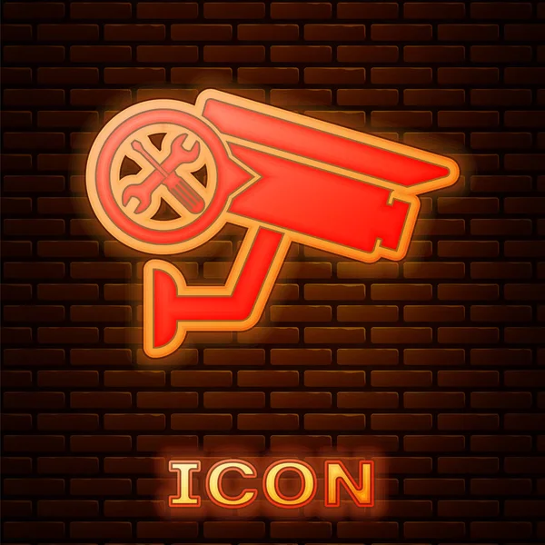Glowing Neon Security Camera Screwdriver Wrench Icon Isolated Brick Wall — Stock Vector