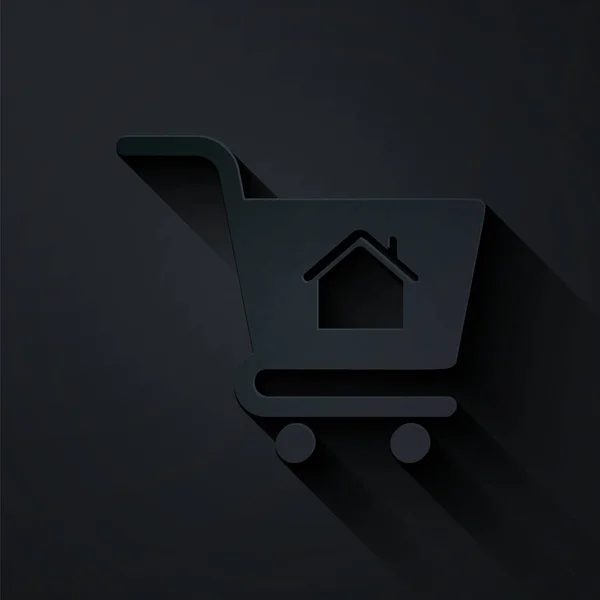 Pappersklipp Shopping vagn med hus ikon isolerad på svart bakgrund. Köpa hus koncept. Bostadslån koncept, hyra, köpa en fastighet. Papperskonst. Vektor Illustration — Stock vektor