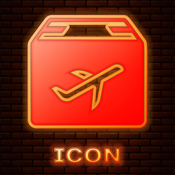 Glowing neon Plane and cardboard box icon isolated on brick wall background. Delivery, transportation. Cargo delivery by air. Airplane with parcels, boxes. Vector Illustration
