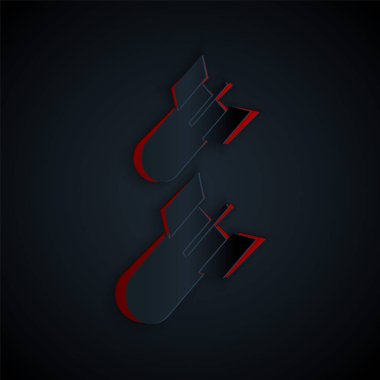 Kağıt kesiği Havacılık bomba ikonu siyah arka planda izole edildi. Roket bombası düşüyor. Kağıt sanatı tarzı. Vektör İllüstrasyonu