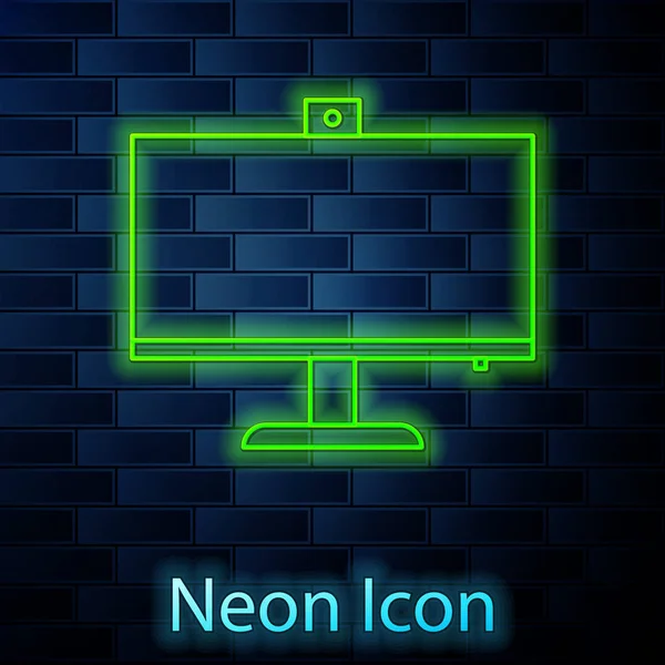 Gloeiende neon lijn Computer monitor pictogram geïsoleerd op baksteen muur achtergrond. PC componentenbord. Vector Illustratie — Stockvector