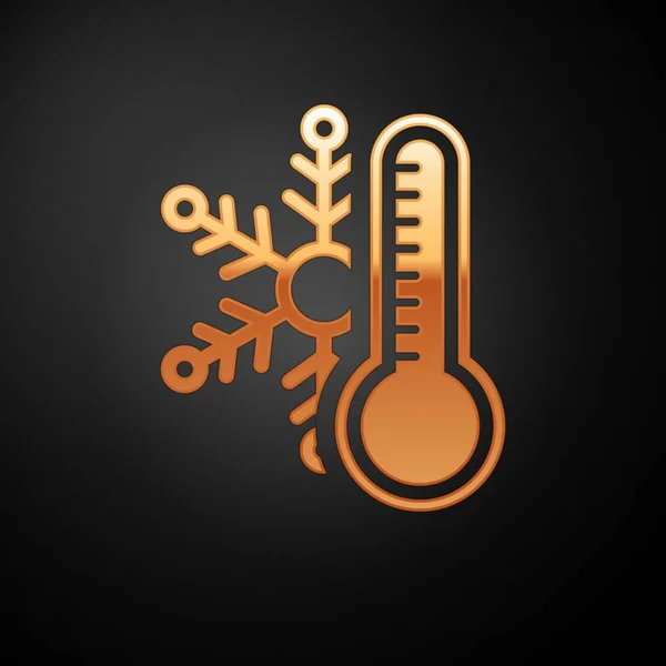 Gouden thermometer met sneeuwvlokje pictogram geïsoleerd op zwarte achtergrond. Vector Illustratie — Stockvector