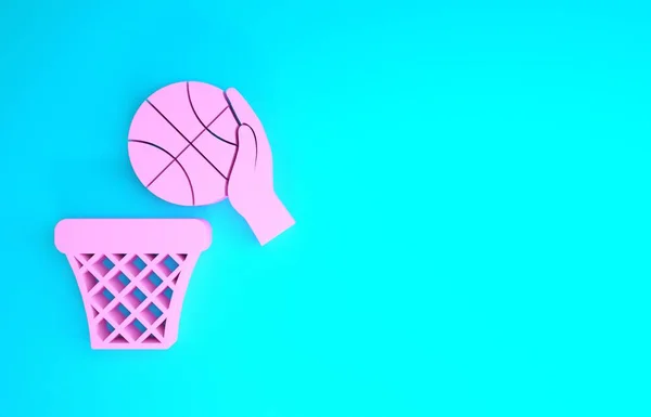 Pink Hand with basketball ball and basket icon isolated on blue background. Ball in basketball hoop. Minimalism concept. 3d illustration 3D render