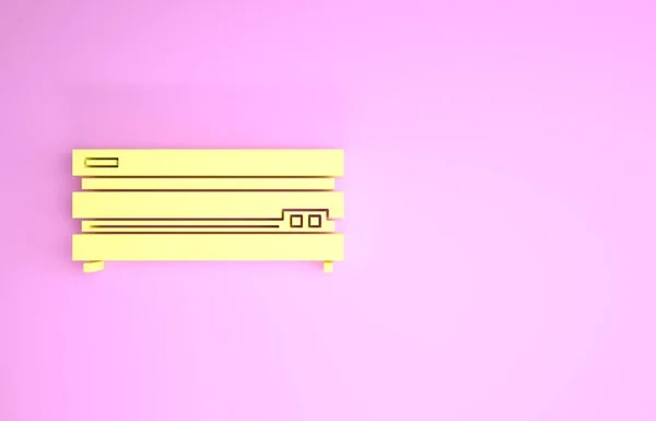 Icona console gialla per videogiochi isolata su sfondo rosa. Concetto minimalista. Illustrazione 3d rendering 3D — Foto Stock