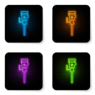 Parlayan neon inşaat kaya matkabı ikonu beyaz arka planda izole edildi. Siyah kare düğme. Vektör İllüstrasyonu