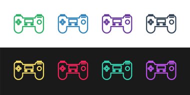 Siyah ve beyaz arkaplanda izole edilmiş çizgi Gamepad simgesi belirle. Oyun kontrolörü. Vektör İllüstrasyonu