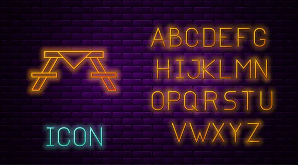 Leuchtende Neon-Linie Picknicktisch mit Bänken auf beiden Seiten des Tisches Symbol isoliert auf Backsteinwand Hintergrund. Neonlicht-Alphabet. Vektorillustration — Stockvektor