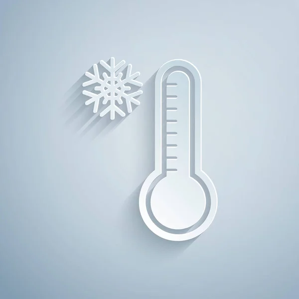 Papírvágás Meteorológiai hőmérő hőmérés és hideg ikon elszigetelt szürke alapon. Hőmérő berendezés, amely meleg vagy hideg időjárást mutat. Papírművészeti stílus. Vektorillusztráció — Stock Vector