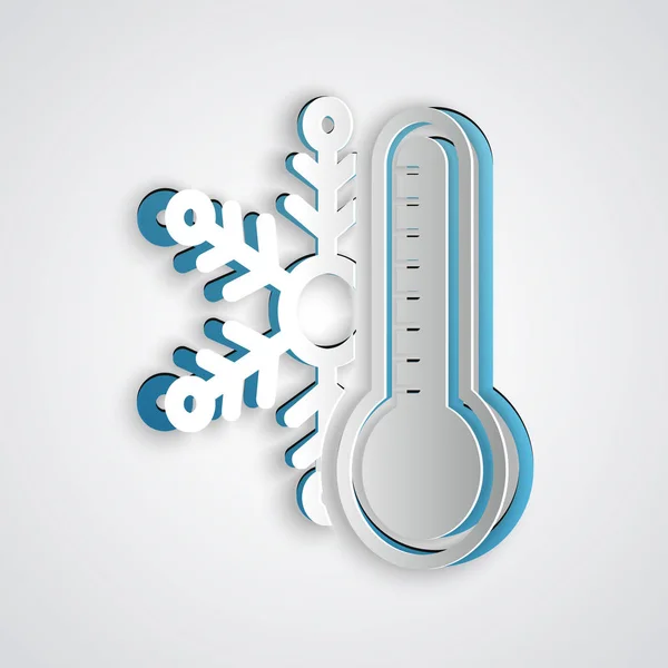 Termômetro de corte de papel com ícone de floco de neve isolado em fundo cinza. Estilo de arte de papel. Ilustração vetorial — Vetor de Stock