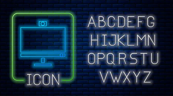 Glödande neon datorskärm ikon isolerad på tegel vägg bakgrund. Komponentskylt. Neonljus alfabet. Vektor Illustration — Stock vektor