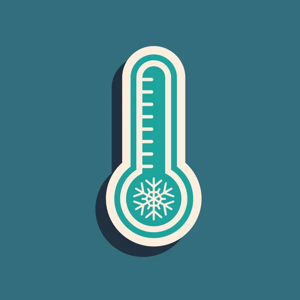 Termómetro de meteorología verde que mide el calor y el frío icono aislado sobre fondo azul. Equipo de termómetro que muestra clima caliente o frío. Estilo de sombra larga. Ilustración vectorial — Vector de stock