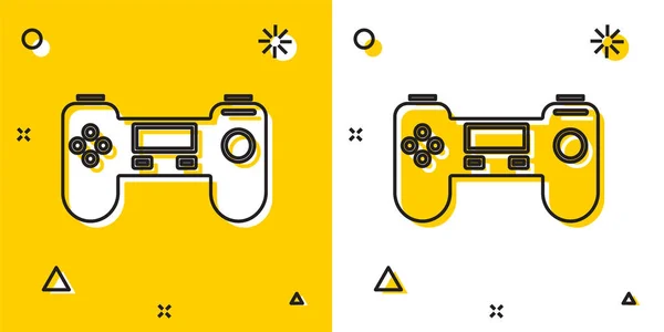 Icône Gamepad noir isolé sur fond jaune et blanc. Contrôleur de jeu. Formes dynamiques aléatoires. Illustration vectorielle — Image vectorielle