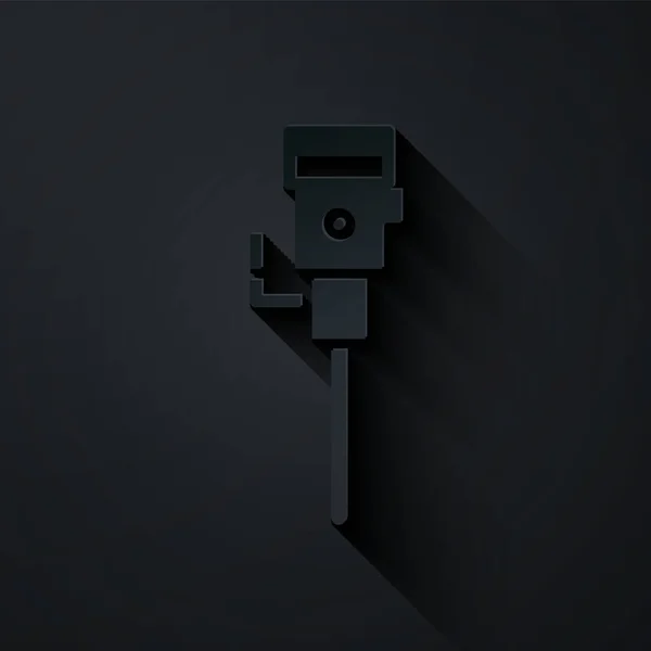 Corte de papel Icono de martillo neumático de construcción aislado sobre fondo negro. Estilo de arte de papel. Ilustración vectorial — Vector de stock