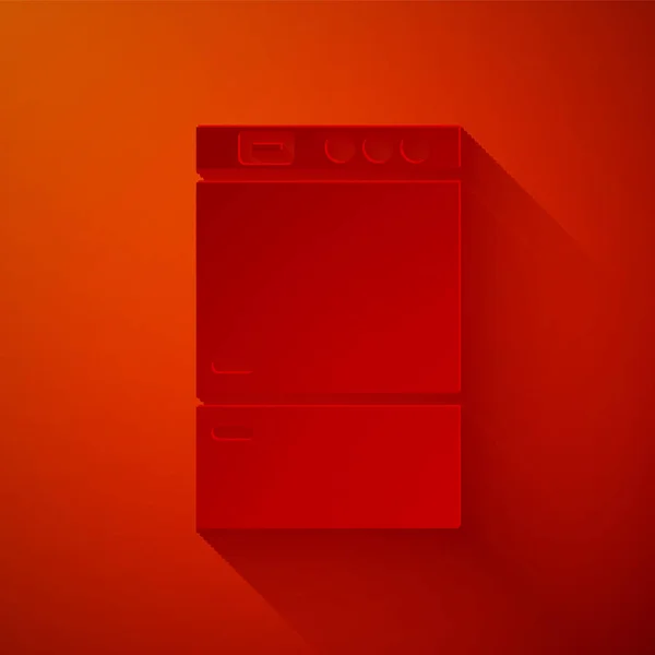 Иконка холодильника вырезана из бумаги на красном фоне. Холодильник-морозильник. Бытовая техника и техника. Бумажный стиль. Векторная миграция — стоковый вектор