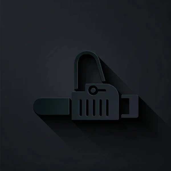 Corte de papel Icono de motosierra aislado sobre fondo negro. Estilo de arte de papel. Ilustración vectorial — Vector de stock