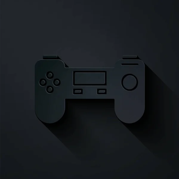 Corte de papel Gamepad icono aislado sobre fondo negro. Controlador de juego. Estilo de arte de papel. Ilustración vectorial — Archivo Imágenes Vectoriales