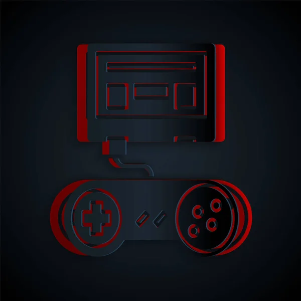 Κομμένη με χαρτί κονσόλα βιντεοπαιχνιδιών με εικονίδιο joystick που απομονώνεται σε μαύρο φόντο. Στυλ χάρτινης τέχνης. Εικονογράφηση διανύσματος — Διανυσματικό Αρχείο
