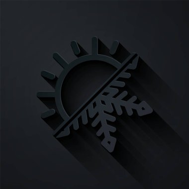 Kağıt kesiği Sıcak ve soğuk sembol. Siyah zemin üzerinde izole edilmiş güneş ve kar tanesi simgesi. Kış ve yaz sembolü. Kağıt sanatı tarzı. Vektör İllüstrasyonu