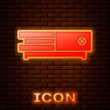 Parlayan neon oyun konsolu simgesi tuğla duvar arka planında izole edildi. Vektör İllüstrasyonu