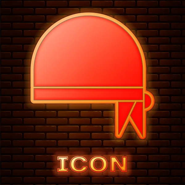 Glödande neon Pirate bandana för huvud ikon isolerad på tegelvägg bakgrund. Vektor Illustration — Stock vektor