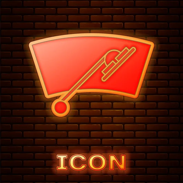 Glödande neon Windscreen torkare ikon isolerad på tegelvägg bakgrund. Vektor Illustration — Stock vektor