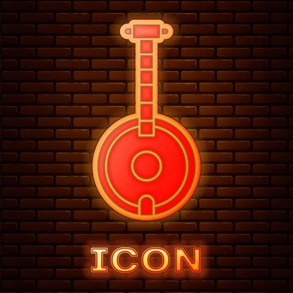 Brillante icono de neón Banjo aislado en el fondo de la pared de ladrillo. Instrumento musical. Ilustración vectorial — Vector de stock