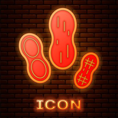 Parlayan neon Peanut simgesi tuğla duvar arkasında izole edilmiş. Vektör İllüstrasyonu