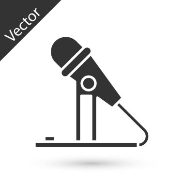 Beyaz arka planda gri mikrofon simgesi izole edildi. Radyodaki mikrofondan. Sözcü işareti. Vektör İllüstrasyonu