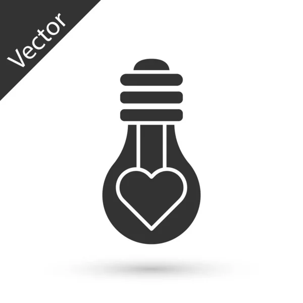 Graue Herzform in einem Glühbirnen-Symbol auf weißem Hintergrund. Liebessymbol. Valentinstag-Symbol. Vektorillustration — Stockvektor