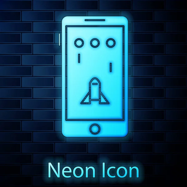 Parlayan neon akıllı telefon ve oyun ikonunda oynamak tuğla duvar arkasında izole edilmiş. Mobil oyun konsepti. Vektör İllüstrasyonu — Stok Vektör