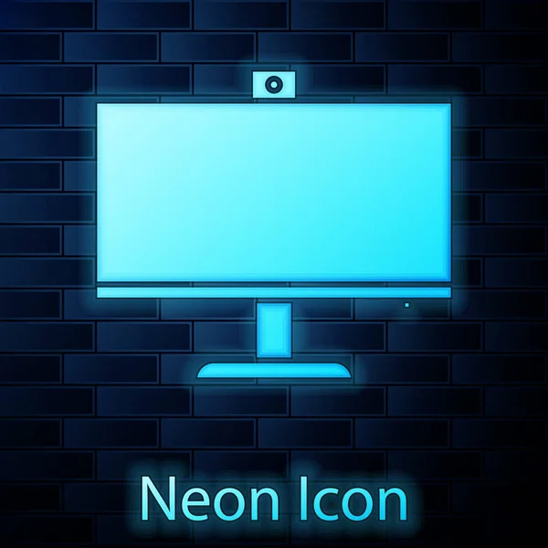 Ragyogó neon számítógép monitor ikon elszigetelt téglafal háttér. Pc alkatrész jel. Vektorillusztráció — Stock Vector