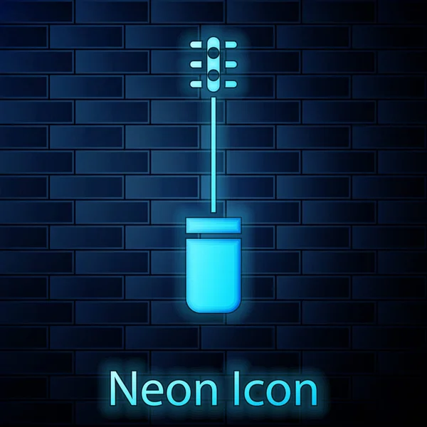 Leuchtende Neon-Mascara-Pinsel-Symbol isoliert auf Backsteinwand Hintergrund. Vektorillustration — Stockvektor
