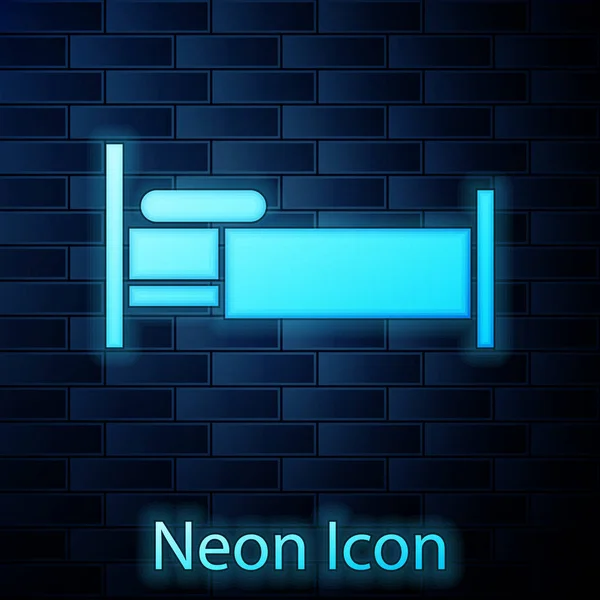 Gloeiende neon Bed icoon geïsoleerd op bakstenen muur achtergrond. Vector Illustratie — Stockvector