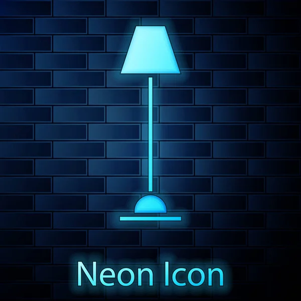 Icono de lámpara de pie de neón brillante aislado en el fondo de la pared de ladrillo. Ilustración vectorial — Vector de stock