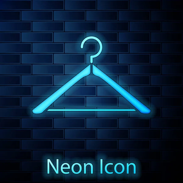 Glowing neon Hanger wardrobe icon isolated on brick wall background. Cloakroom icon. Clothes service symbol. Laundry hanger sign. Vector Illustration — Stock Vector