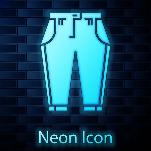 Glödande neon Byxor ikon isolerad på tegel vägg bakgrund. Vektor Illustration — Stock vektor