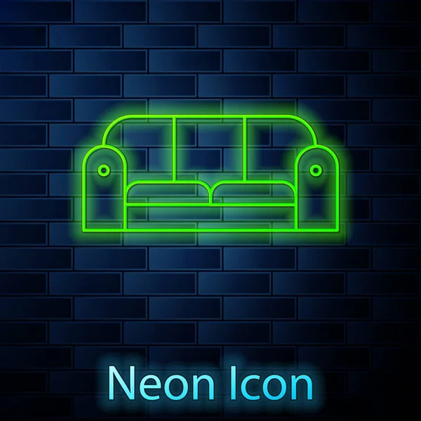 Leuchtende Neon-Linie Sofa-Symbol isoliert auf Backsteinwand Hintergrund. Vektorillustration — Stockvektor