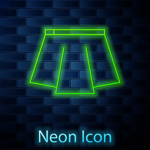Lysende neonlinje Skjørt ikon isolert på murveggbakgrunn. Vektorbelysning – stockvektor